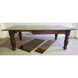 A large Jacobean revival Victorian oak extending dining table, circa 1880, with a winding