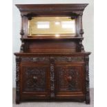 A large Victorian oak Jacobean revival sideboard, late 19th century, with a mirrored back with