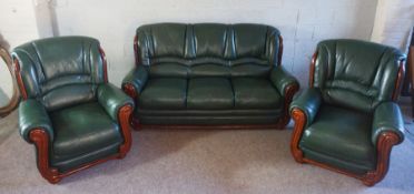 A modern three piece green leather suite, with fire labels, sofa, 177cm wide (3)