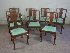 A set of eight modern Queen Anne style dining chairs, with arched backs, including two armchairs;