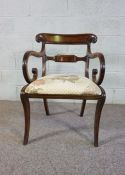 A large George III ladder backed arm chair, 19th century, with a very wide seat, pierced scrolled