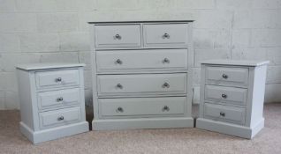A modern light grey painted dressing table, 75cm high, 107cm wide; together with a similar chest