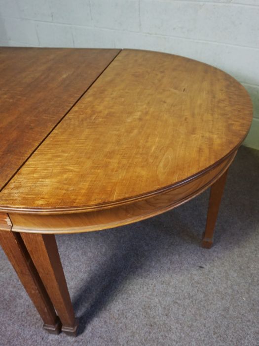 A vintage oak extending dining or serving table, (used as a textile cutting table a famous - Image 4 of 8