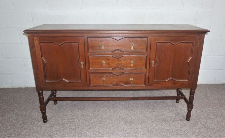 A modern beech dresser, 20th century, with three drawers and two cabinet doors, 100cm high, 188cm