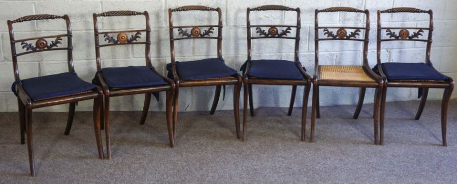 A set of six Regency simulated rosewood ‘Trafalgar’ dining chairs, early 19th century, each with a
