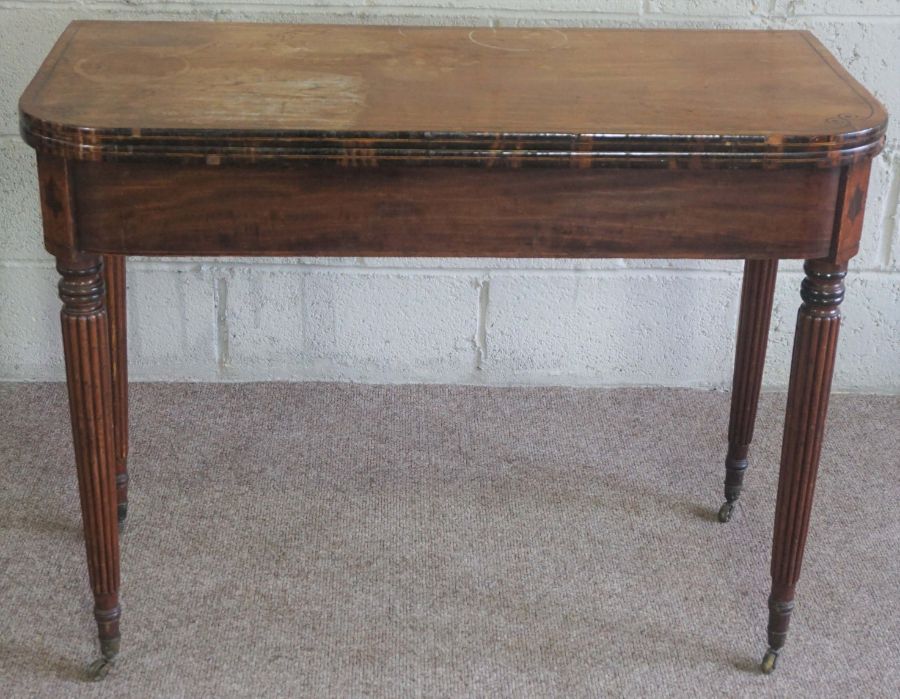 A Regency mahogany tea table, circa 1820, with rounded rectangular fold over top and set on four