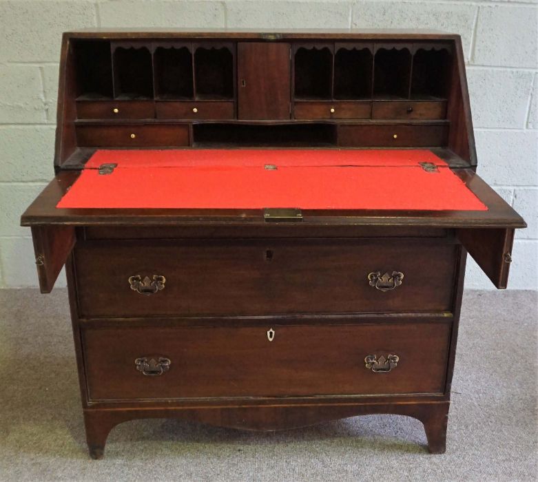 A George III mahogany bureau, late 18th century, with a fall front opening to reveal a fitted - Image 4 of 10