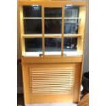 A modern cherry veneered Jewellers shop display cabinet, with a glazed top, fitted with shelves