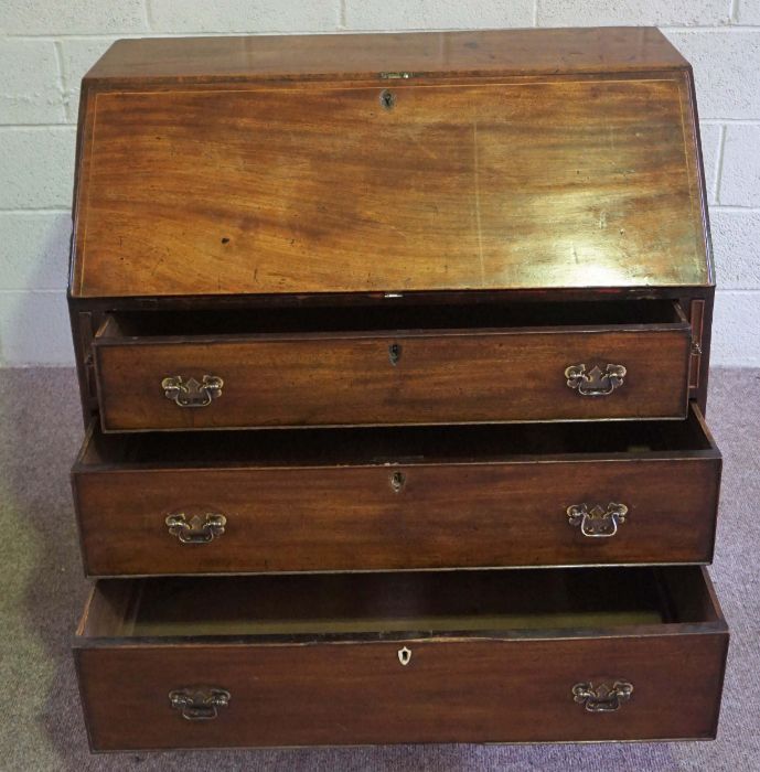 A George III mahogany bureau, late 18th century, with a fall front opening to reveal a fitted - Image 6 of 10