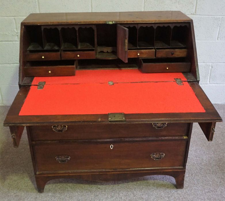 A George III mahogany bureau, late 18th century, with a fall front opening to reveal a fitted - Image 5 of 10