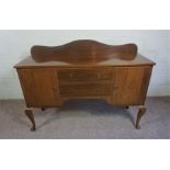 A modern beech sideboard, 110cm high, 150cm wide; together with a matching dressing table, 76cm