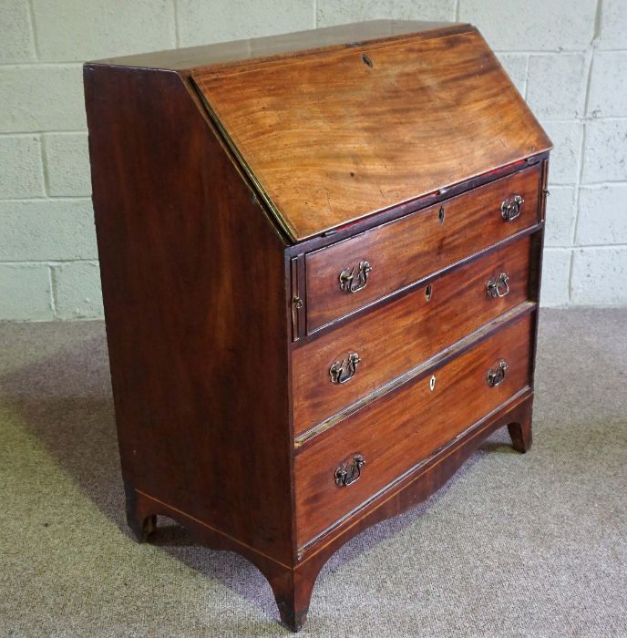 A George III mahogany bureau, late 18th century, with a fall front opening to reveal a fitted - Image 7 of 10