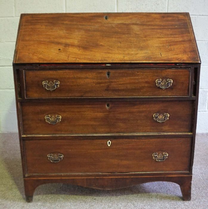 A George III mahogany bureau, late 18th century, with a fall front opening to reveal a fitted - Image 2 of 10
