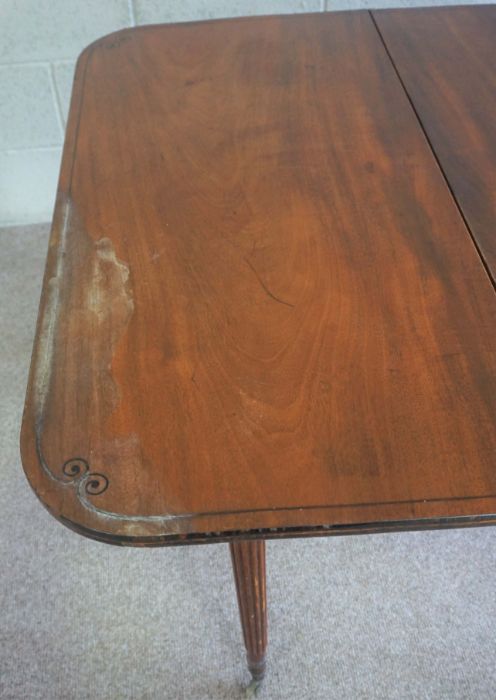 A Regency mahogany tea table, circa 1820, with rounded rectangular fold over top and set on four - Bild 5 aus 7