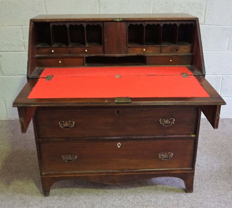 A George III mahogany bureau, late 18th century, with a fall front opening to reveal a fitted - Image 3 of 10