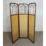 An Edwardian three fold mahogany framed screen, 170cm high, 46cm wide per fold