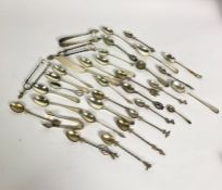 A group of assorted silver flatware, including Victorian bright cut silver tea spoons, a group of