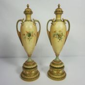 A pair of Royal Worcester blush ivory porcelain companion vases, with Registration Mark RN303838,