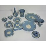 A selection of Wedgwood blue jasper china, including two heart shaped boxes, a night stick etc.;