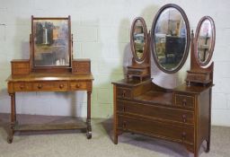 A Victorian walnut dressing table, with hinged mirror, arrangement of seven drawers, 155cm high,