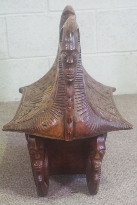 A Congolese style carved hardwood ceremonial chest, African, modern, 20th century, in the form of - Image 2 of 6