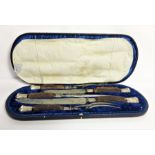 A fine Victorian silver and antler handled carving set, hallmarked Sheffield 1893, the blades by