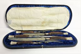 A fine Victorian silver and antler handled carving set, hallmarked Sheffield 1893, the blades by