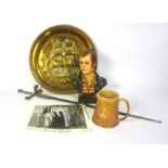 A box of assorted items, including a decorative small sword, A “Dryborough’s Burns’ Ale” bust of