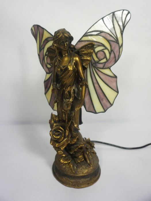 An Art Nouveau style ‘Fairy’ table lamp, with stained glass wings, 40cm high; together with an oak - Image 5 of 8