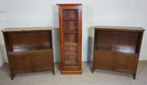 A vintage mahogany bookcase, with adjustable shelves and glazed door, 150cm high; together with