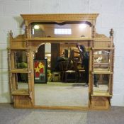 A large Victorian oak over-dresser mirror, late 19th century, with moulded cornice and turned