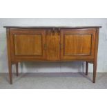 An Edwardian style sideboard, early 20th century, with two cabinet doors