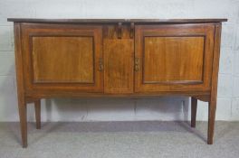 An Edwardian style sideboard, early 20th century, with two cabinet doors