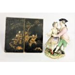 A pair of Japanese export black lacquered book ends, Meiji period, early 20th century, of wedge