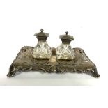 A Victorian silver inkstand, hallmarked Sheffield 1847, with date lozenge, the pierced and scroll