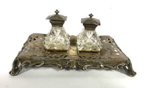 A Victorian silver inkstand, hallmarked Sheffield 1847, with date lozenge, the pierced and scroll