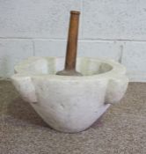 A large stone mortar, 40cm wide; together with a large turned pestle