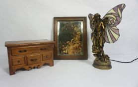 An Art Nouveau style ‘Fairy’ table lamp, with stained glass wings, 40cm high; together with an oak