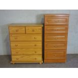 A pine blanket chest, together with a modern pine chest of drawers and a tall modern chest of five