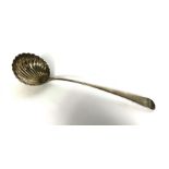 A George III silver soup ladle, hallmarked London 1780, TW?, with scalloped bowl, 35cm long, 175g