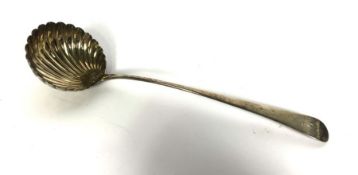 A George III silver soup ladle, hallmarked London 1780, TW?, with scalloped bowl, 35cm long, 175g
