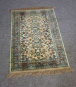 Four rugs, including a large modern wool Mahal type carpet, mid 20th century, 360cm XV 270cm;and