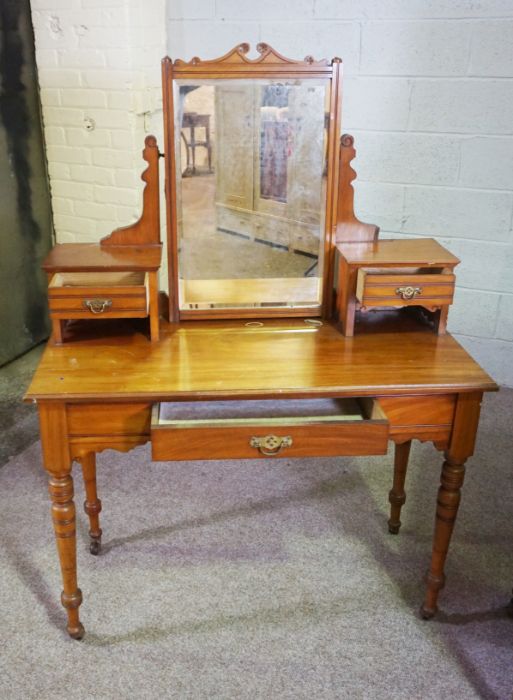 An Edwardian walnut dressing table, circa 1901, with an oval hinged mirror and arrangement of - Image 2 of 4