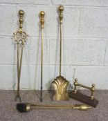 A 19th century brass fire curb, with pierced fretwork decoration, 104cm wide; together with a set of