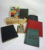 A box of assorted books, including a group of 70’s and 80’s Giles annuals and a box containing loose