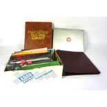 A group of assorted First Day Cover stamp albums, and a box of loose stamps (a lot)