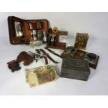 A box of ephemera, including vintage watches, a leather and cast turtle paperweight, pipes and other
