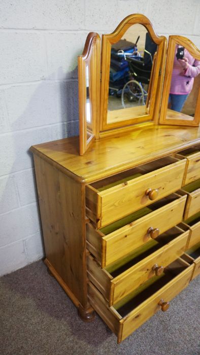 A modern pine chest of drawers, 85cm high, 110cm wide; together with a pine framed folding - Image 6 of 7