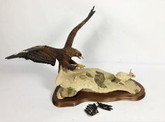 Border Fine Arts, A Golden Eagle taking a mountain hare, coloured resin figure, wing tips require