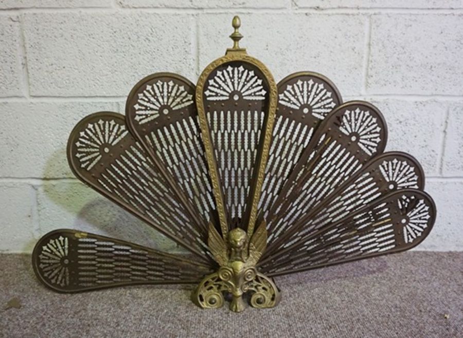 A Victorian serpentine brass fretwork fire curb, 140cm long; and brass and iron spark guard (2) - Image 6 of 7